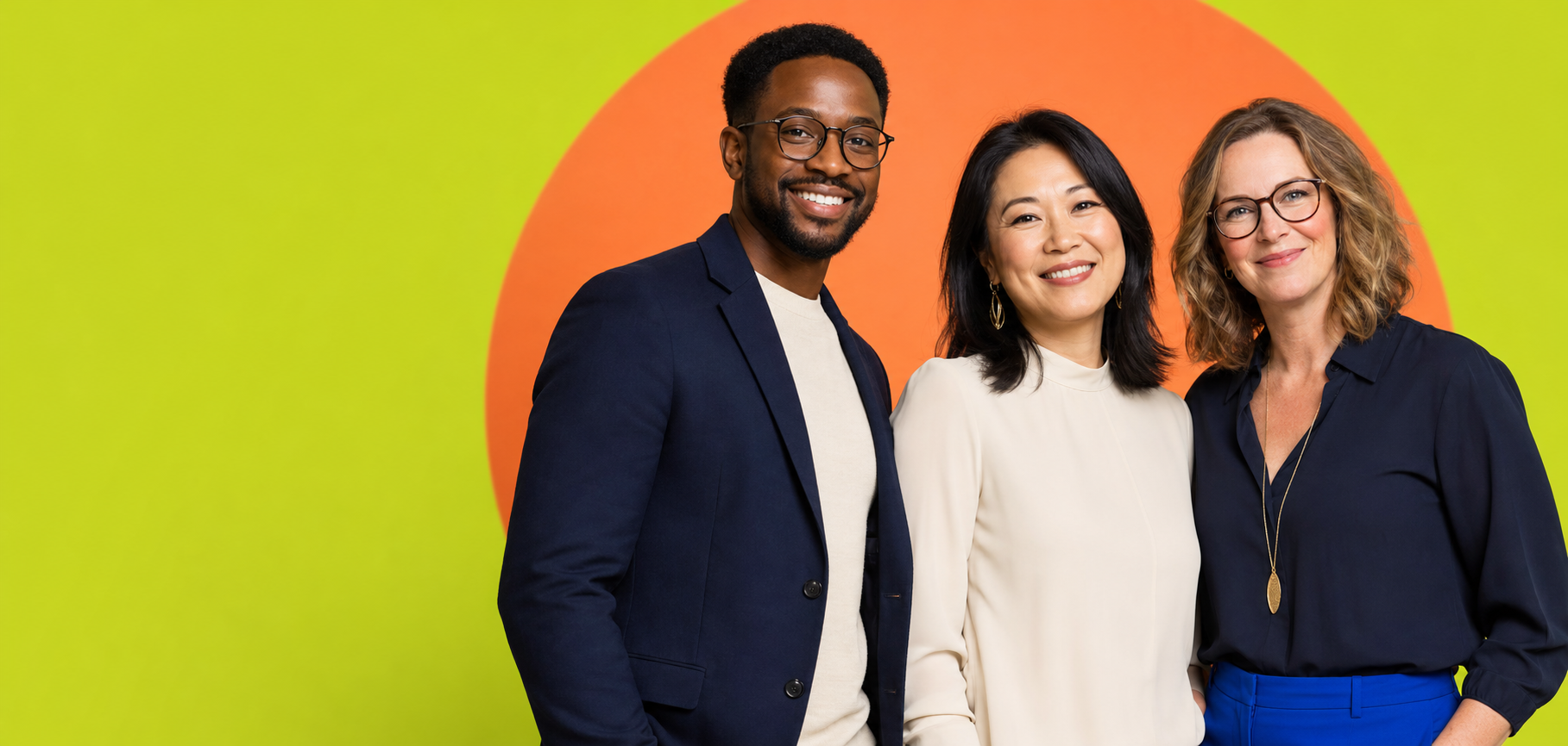 Three smiling talent professionals standing together